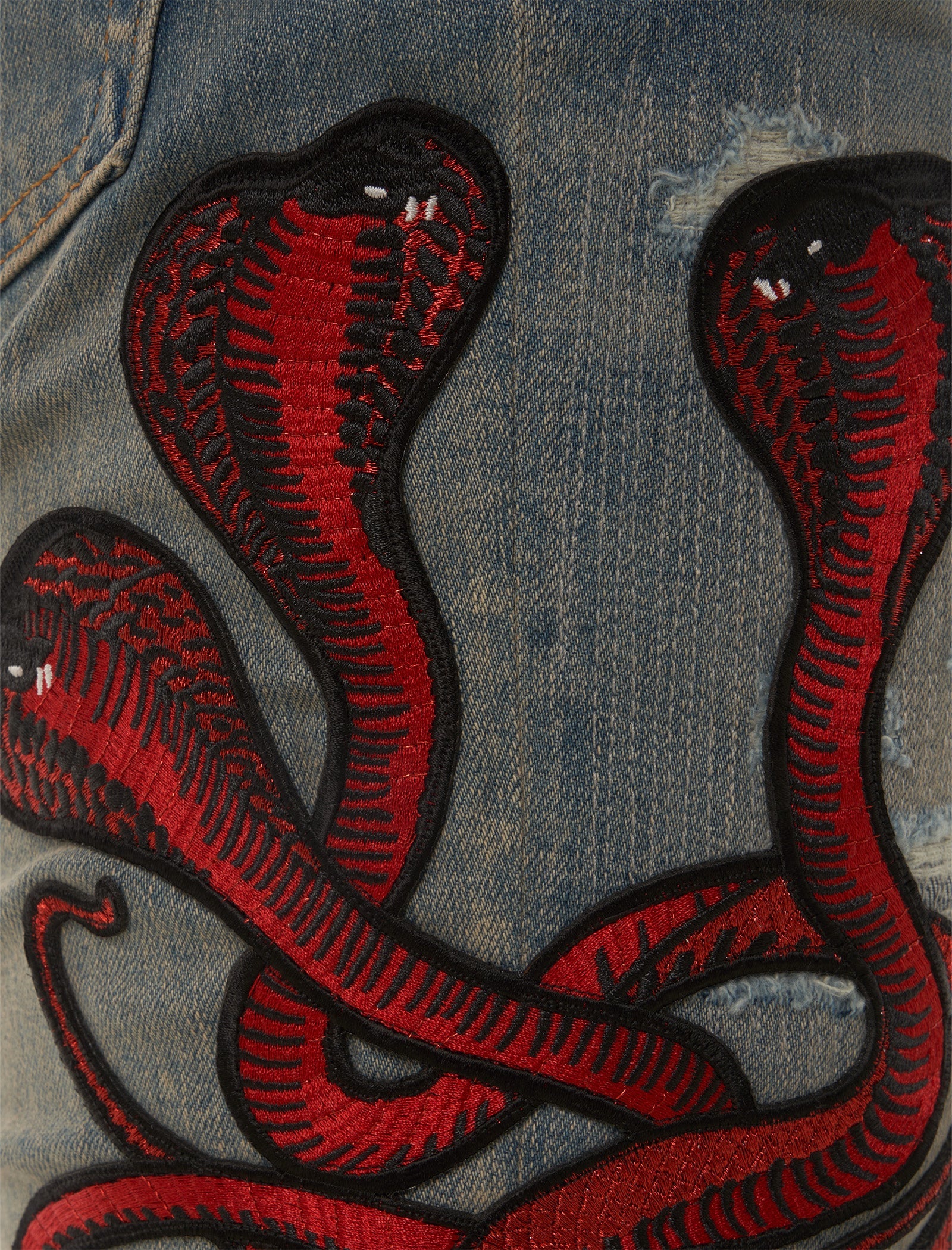 Distressed Red Venom jeans