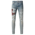 Distressed Red Venom jeans